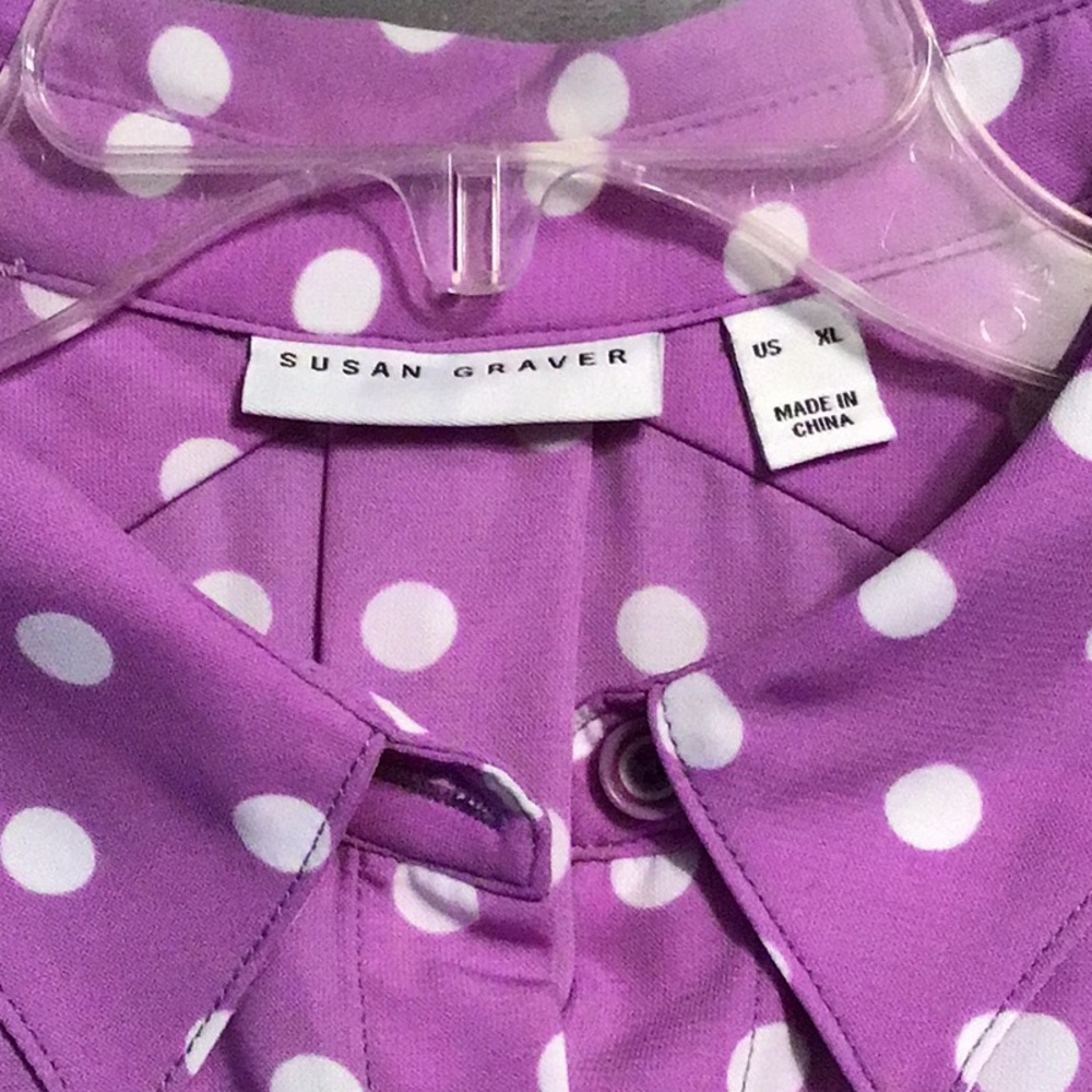 Lavender button down blouse with white polka dots.